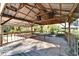 Wooden pergola with metal roof and speakers at 4501 Keene Rd, Plant City, FL 33565