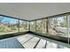 Spacious screened porch overlooking wooded area at 4501 Keene Rd, Plant City, FL 33565