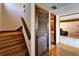 Wooden staircase with access to upper floor at 4501 Keene Rd, Plant City, FL 33565