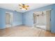 Spacious bedroom with access to a sunroom and updated flooring at 6506 Remus Dr, New Port Richey, FL 34653