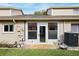 Exterior view of the back of the house showing a screened-in porch at 6506 Remus Dr, New Port Richey, FL 34653