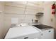 Laundry room with Maytag washer and dryer at 6506 Remus Dr, New Port Richey, FL 34653