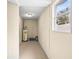 Unfinished basement with water heater and storage at 9104 Sandcroft Ct, Tampa, FL 33615