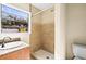 Clean bathroom with shower stall, sink, and toilet at 9104 Sandcroft Ct, Tampa, FL 33615