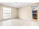 Bedroom featuring tile floors and backyard access at 9104 Sandcroft Ct, Tampa, FL 33615