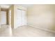 Bedroom with double door closet and tile floor at 9104 Sandcroft Ct, Tampa, FL 33615