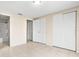 Bedroom with bathroom access and double closets at 9104 Sandcroft Ct, Tampa, FL 33615