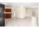 Dining area with tile floors and access to kitchen at 9104 Sandcroft Ct, Tampa, FL 33615