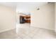 View of kitchen with black appliances and wood cabinets at 9104 Sandcroft Ct, Tampa, FL 33615