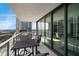 Spacious balcony with city views and outdoor furniture at 100 1St N Ave # 1601, St Petersburg, FL 33701