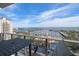 Balcony with table and chairs, offering water views at 100 1St N Ave # 1601, St Petersburg, FL 33701