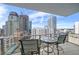 City view balcony with small table and chairs at 100 1St N Ave # 1601, St Petersburg, FL 33701