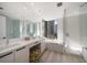 Spa-like bathroom with double vanity and walk-in shower at 100 1St N Ave # 1601, St Petersburg, FL 33701