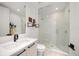 Modern bathroom with white vanity and a glass shower at 100 1St N Ave # 1601, St Petersburg, FL 33701