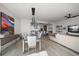 Open dining area with modern light fixtures and kitchen access at 100 1St N Ave # 1601, St Petersburg, FL 33701