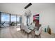 Bright dining room with glass table and water view at 100 1St N Ave # 1601, St Petersburg, FL 33701