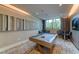 Upscale game room boasts a stylish pool table and comfortable seating at 100 1St N Ave # 1601, St Petersburg, FL 33701