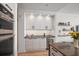 Modern kitchen with stainless steel appliances and an island at 100 1St N Ave # 1601, St Petersburg, FL 33701