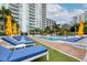 Inviting pool area with plenty of lounge chairs at 100 1St N Ave # 1601, St Petersburg, FL 33701