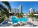 Expansive pool area with lounge chairs and tropical landscaping at 100 1St N Ave # 1601, St Petersburg, FL 33701