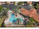 Aerial view of community pool, spa, and surrounding buildings at 12055 Gandy N Blvd # 243, St Petersburg, FL 33702