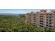Aerial view of a multi-story building with water views at 12055 Gandy N Blvd # 243, St Petersburg, FL 33702