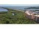Aerial view of a waterfront community with lush landscaping at 12055 Gandy N Blvd # 243, St Petersburg, FL 33702