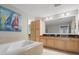 Spa-like bathroom with double vanity and large soaking tub at 12055 Gandy N Blvd # 243, St Petersburg, FL 33702