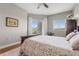 Comfortable bedroom with king-size bed and hardwood floors at 12055 Gandy N Blvd # 243, St Petersburg, FL 33702