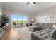 Relaxing living room with sectional sofa and hardwood floors at 12055 Gandy N Blvd # 243, St Petersburg, FL 33702