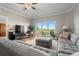 Spacious living room with sectional sofa and access to balcony at 12055 Gandy N Blvd # 243, St Petersburg, FL 33702