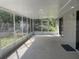 Spacious screened porch, perfect for relaxing outdoors at 1311 4Th W St, Palmetto, FL 34221