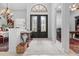 Bright and spacious entry with elegant double doors at 20109 Oak Alley Dr, Tampa, FL 33647