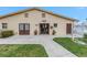 Community building with entrance and landscaping at 3500 Lake Bayshore Dr # K-101, Bradenton, FL 34205