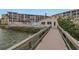 Wooden footbridge over canal leading to community at 3500 Lake Bayshore Dr # K-101, Bradenton, FL 34205