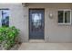 Unit 101's front door features a decorative glass insert at 3500 Lake Bayshore Dr # K-101, Bradenton, FL 34205