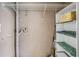 White shelving and wire racks for storage in this closet at 3500 Lake Bayshore Dr # K-101, Bradenton, FL 34205