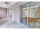 Sunroom with tiled floors, sliding glass doors, and access to other rooms at 3500 Lake Bayshore Dr # K-101, Bradenton, FL 34205