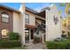 Villa exterior with entrance and landscaping at 3505 Tarpon Woods Blvd # K403, Palm Harbor, FL 34685