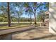 Private patio overlooking a lush green space at 3505 Tarpon Woods Blvd # K403, Palm Harbor, FL 34685