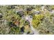 Single-Gathering home situated on a tree-lined street at 4595 Northwood Ter, Sarasota, FL 34234