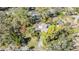 Single-Gathering home nestled amongst lush trees at 4595 Northwood Ter, Sarasota, FL 34234