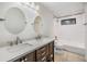 Double vanity bathroom with updated fixtures and bathtub at 4595 Northwood Ter, Sarasota, FL 34234