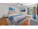 Spacious bedroom with hardwood floors and large window at 4595 Northwood Ter, Sarasota, FL 34234