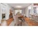 Elegant dining room, hardwood floors, and kitchen views at 4595 Northwood Ter, Sarasota, FL 34234