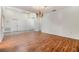 Simple dining room with hardwood floors and chandelier at 4595 Northwood Ter, Sarasota, FL 34234
