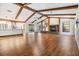 Spacious living room with hardwood floors and exposed beams at 4595 Northwood Ter, Sarasota, FL 34234