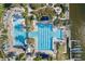Aerial view of a community pool with lap lanes and a water play area at 805 Islebay Dr, Apollo Beach, FL 33572