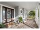 Inviting front porch with seating area at 805 Islebay Dr, Apollo Beach, FL 33572