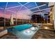 Enjoy this luxurious pool and spa at sunset at 805 Islebay Dr, Apollo Beach, FL 33572